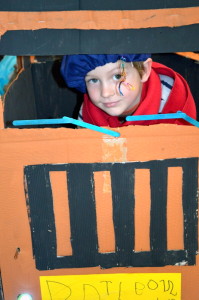 Ooh La La:  Pre-Primary student, Sol takes a ride in a  French taxi, made by the Kindy-Pre students. 