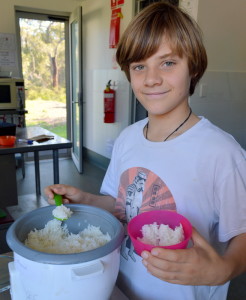 Have a Rice Day:  Year 6 student, Jarra Mills helped to serve rice in the canteen. 