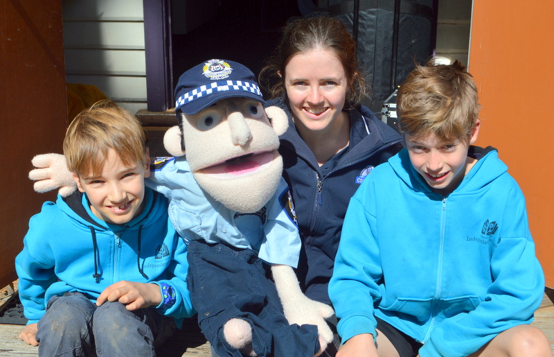 COP CARE: Van Hulseboch, and Jake McKenzie of Year 3 met with Courtney Turner and Constable Care. 