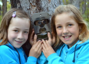 Action: Lowana O’Grady and Willow Hardy (yr 4) with a state-of-the-art infra-red camera which will track fauna in MRIS bushland. 